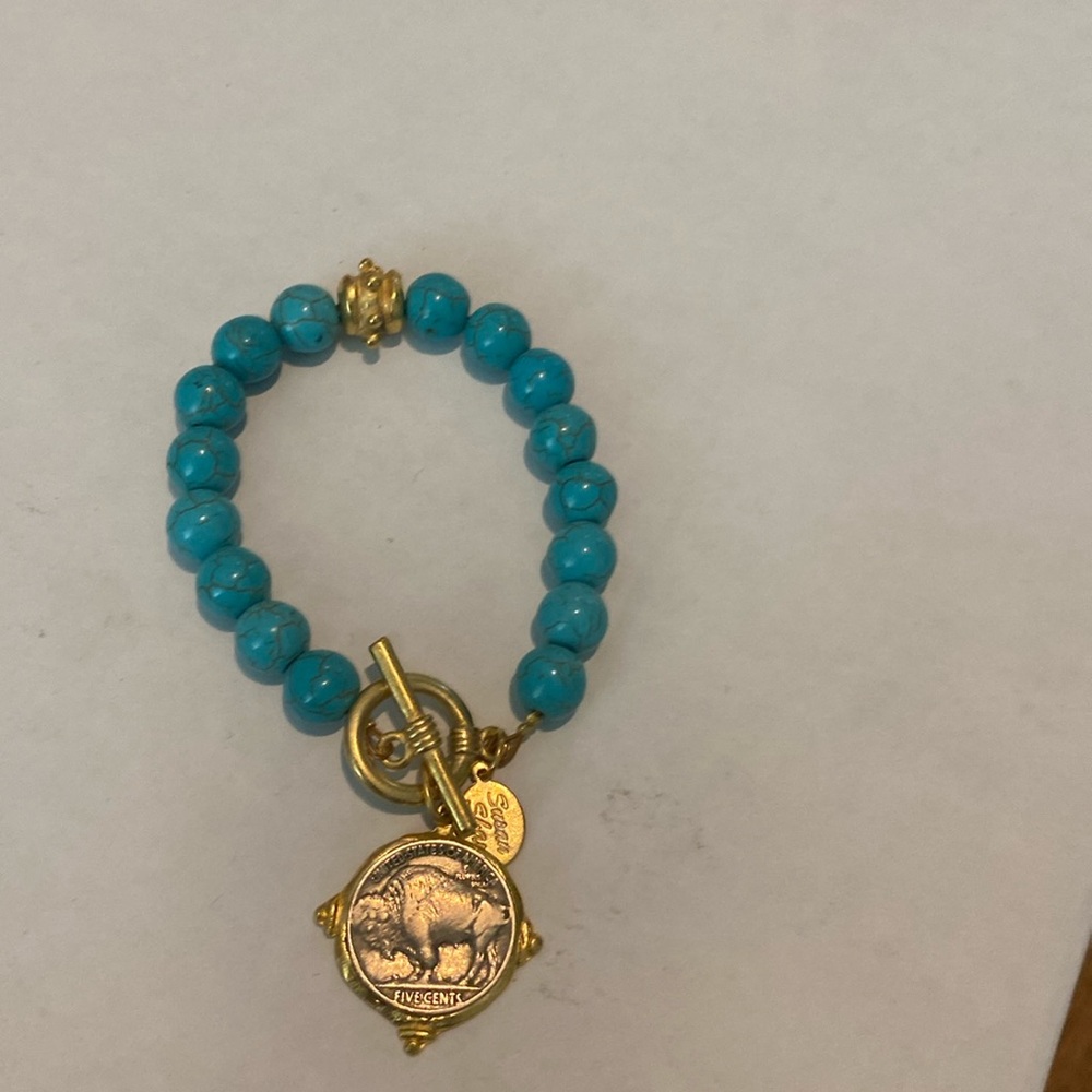 Susan Shaw buffalo nickel turquoise bracelet. Gold tone.